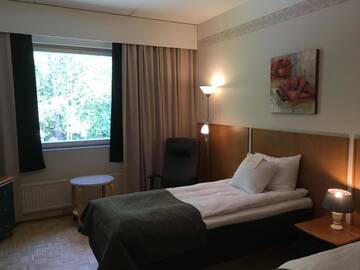 Фото номера Двухместный номер с 2 отдельными кроватями Отель Finlandia Hotel Fooninki г. Сейняйоки 4