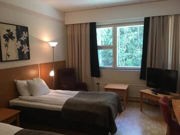Фото номера Двухместный номер с 2 отдельными кроватями Отель Finlandia Hotel Fooninki г. Сейняйоки 8