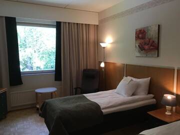 Фото номера Двухместный номер с 2 отдельными кроватями Отель Finlandia Hotel Fooninki г. Сейняйоки 9