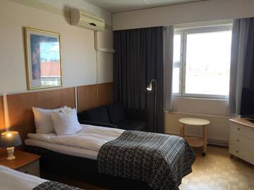Фото номера Двухместный номер с 2 отдельными кроватями Отель Finlandia Hotel Fooninki г. Сейняйоки 6