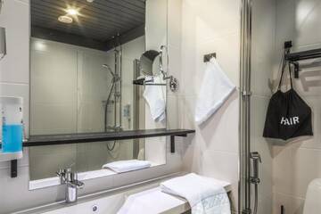 Фото номера Стандартный одноместный номер с душем Отель Hotelli-Ravintola Alma г. Сейняйоки 2