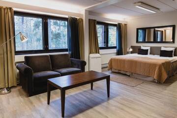Фото номера Стандартный семейный номер Отель Hotel Sorsanpesä г. Сейняйоки 3